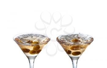 Cocktail with olive splash isolated on white