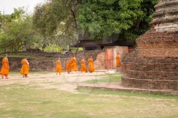 AYUTTHAYA THAILAND APRIL 7, 2017 a group of Buddhist child monks with their elder in the temple of Wat Phra Sri Sanphet, Historic City of Ayutthaya