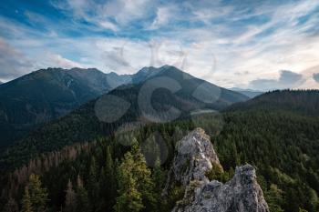 amazing nature, summer in the mountains. Travel and hike. Tatra Mountains in summer time. beautiful panorama of agricultural area. gorgeous mountain ridge with high rocky peaks