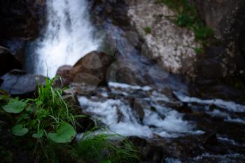 Nature of the North Caucasus. Great full-blown Waterfall Shumka, Dombai, Karachay-Cherkessia, Russia.