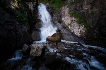 Nature of the North Caucasus. Great full-blown Waterfall Shumka, Dombai, Karachay-Cherkessia, Russia.