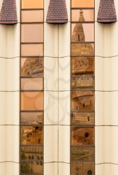 Reflection of old traditional castle turret in front of Hilton Hotel in Castle district of Buda, Budapest, Hungary