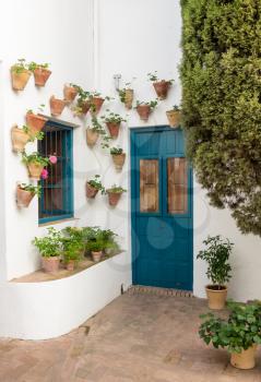 Door into house from courtyard Palace of Viana in Cordoba, Andalucia, Spain