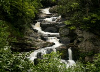 Cullasaja Falls waterfall with blurred motion cascading down the rocks on the Mountain Water Scenic Byway near Highlands in North Carolina, USA