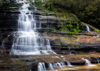 Multiple cascades of upper section of Katoomba Falls in the Blue Mountains of New South Wales near Sydney Australia