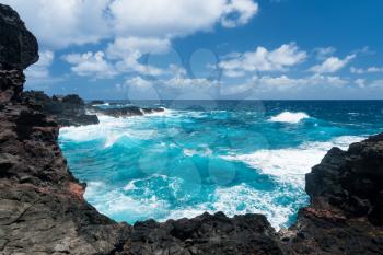 Rugged and beautiful Olivine pools on coastline around north east of Hawaiian island of Maui on Kahekili highway