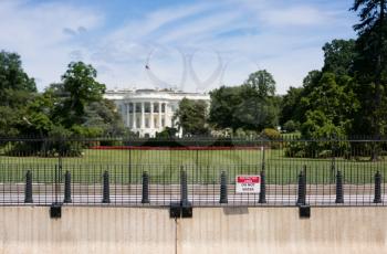 South Lawn view of White House seen behind restricted sign in Washington DC as the security perimeter is expanded to deter fence climbers