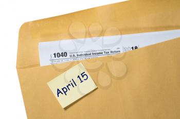 Printed copy of Form 1040 for income tax return for 2018 with reminder for April 15, 2019 deadline