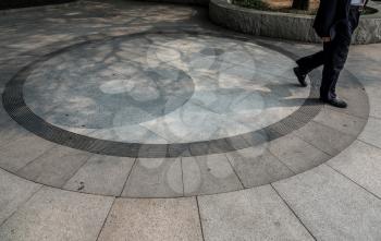 Yin Yang symbol on pavement at Temple of Supreme Purity of Tai Qing Gong at Laoshan