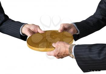 Hands of three financial traders gripping gold eagle coin isolated against a white background