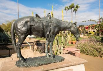 SAN JUAN CAPISTRANO, CALIFORNIA - 1 NOVEMBER 2017: Statue commemorating Portola Riders in San Juan Capistrano mission