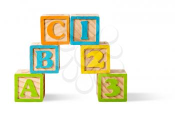 ABC and 123 Number wooden blocks stacked on white background and isolated with path