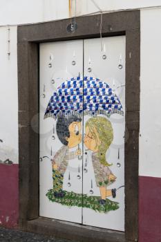 CAMARA DE LOBOS, MADIERA - MARCH 12, 2018: Artwork made with recycled drink cans in Camara de Lobos on island of Madiera