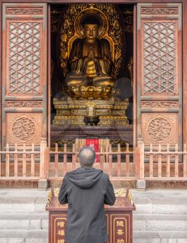 Worship outside the temple with Buddha at Giant Wild Goose Pagoda in Xi'an