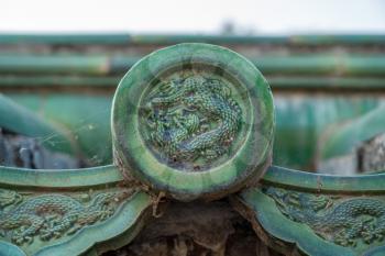 Ornate pottery tiles on roof of Temple of Heaven in Beijing, China
