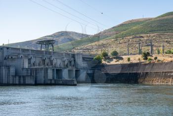Electricity hydropower generation at the Barragem do Pocinho dam on the Douro river in Portugal