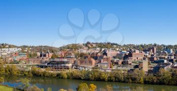 Aerial drone panoramic shot of the downtown campus of the West Virginia university by the river in the fall