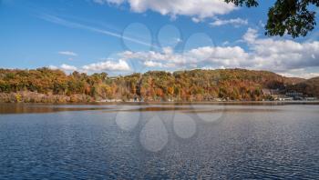 Panorama of the autumn fall colors surrounding Cheat Lake from the waterside near Morgantown, West Virginia