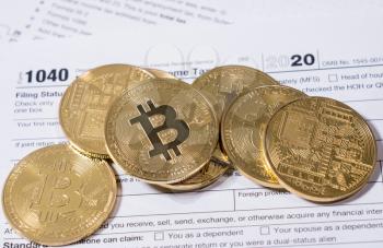 Form 1040 for 2020 with bitcoin coins for reporting of gains from cyber currency trading or investment