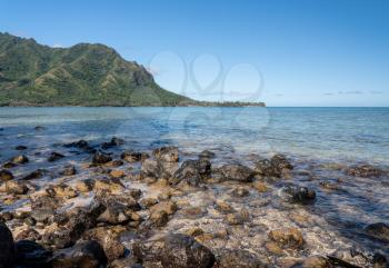 View to mountain range and peninsula from Kahana State Park in Oahu, Hawaii