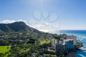 Aerial drone view of the sea front on Waikiki with Diamond Head in the background