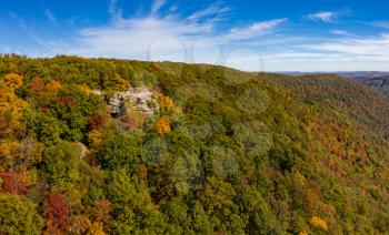 Aerial drone image of the Coopers Rock state park overlook over the Cheat River in narrow wooded gorge in the autumn. Located near Morgantown WV