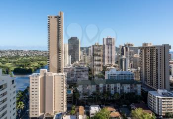 Hotels and apartments in the modern part of Waikiki by the canal on Oahu