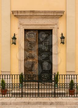 Solid wooden entrance doors to Kyra-Panagia Faneromeni or Virgin of Strangers church