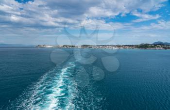 Wake behind departing cruise ship from port of Kerkyra