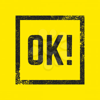 OK stamp. Textured black stamp isolated on yellow background. Design for badge, applique, label, t-shirts, jeans, casual wear. Vector illustration.