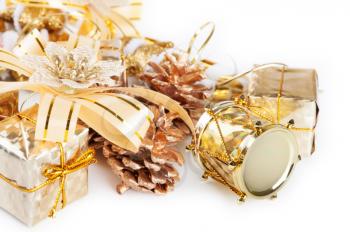 Golden Christmas decorations on a white background