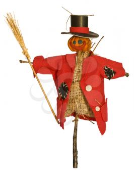 Scarecrow for the garden with a broom in his hand. The head of a pumpkin for Halloween holiday