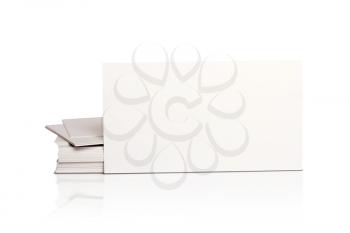 Mockup pile of blank white business cards isolated on white background