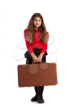 little girl packed her vintage retro suitcase
