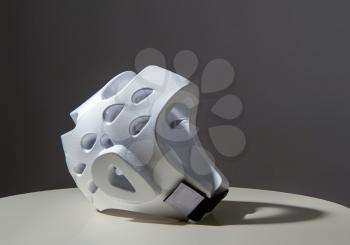 White protective light helmet for karate do, for training and competition. New mandatory requirement in some clubs