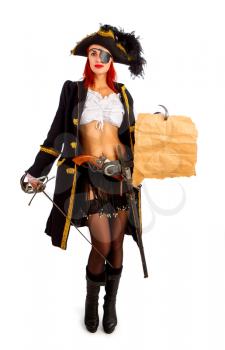 sexy girl in a pirate costume and a cocked hat stands on a white background holding a piece of old parchment worn on a hook with an empty place for text or card.