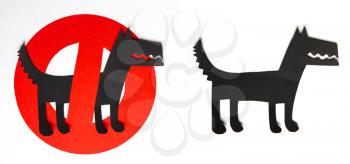 sign cut out of black and red paper prohibiting dog walking