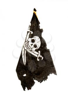 Torn and shabby black pirate flag Jolly Roger isolated on white background