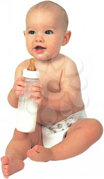 Royalty Free Photo of an Infant Child Sitting Holding a Bottle