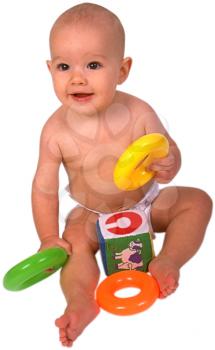 Royalty Free Photo of an Infant Child Sitting, Playing with Toys