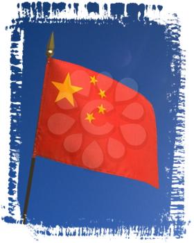 Royalty Free Photo of a China Flag with a Blue Sky Background