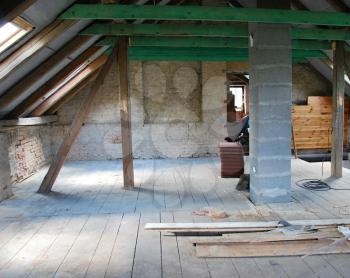 Photo of attic construction in cottage.