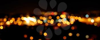 Photo of glittering lights in night city. 