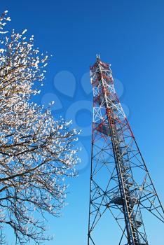 GSM tower covered by snow.