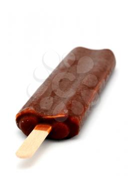 Ice lolly with milk chocolate placed on white background.