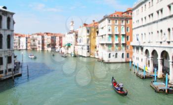 Tilt shift shot of main canal in Venice with the gondola.