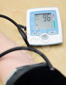 Instrument for measuring blood pressure on hand. Closeup shot.