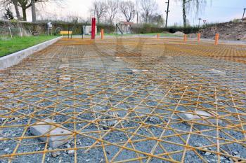 Newly Built House Foundations with Reinforcing Wire Mesh Ready for Concrete Base Plate. 