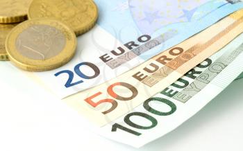 European Union banknotes and coins on white background. Euro currency. Euro coins. Euro banknote. 100 Euro. 50 Euro. 20 Euro. Euro bills. EU Bills 