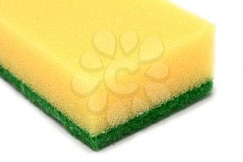 Yellow washing kitchen sponge with abrasive green scourer over white background.